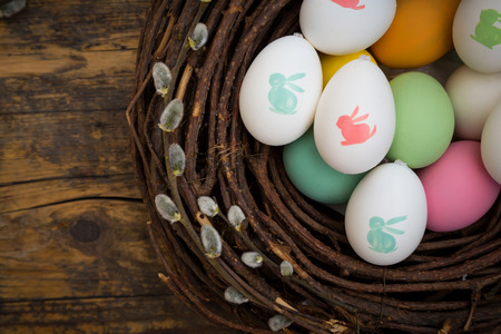 Easter decoration, Easter eggs, twigs on woodの写真素材