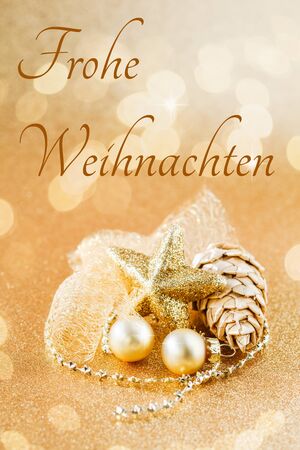 Christmas arrangement with Christmas tree decorations, golden, Merry Christmasの写真素材