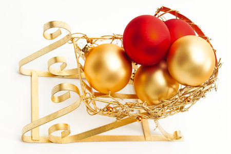 Slide with golden glitter balls, christmas decorationの写真素材