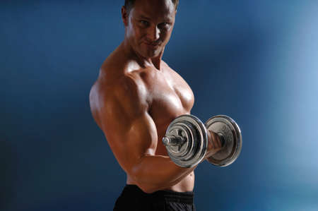 Man Lifting a Dumbbellの写真素材