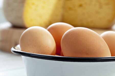 Eggs in metal bowl close upの写真素材