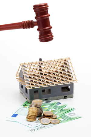 Model house under auctioneer's hammerの写真素材