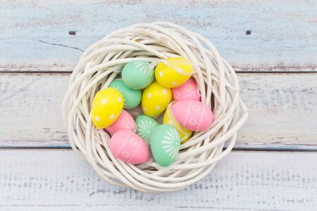 Easter decoration, Easter eggs, twigs on woodの写真素材