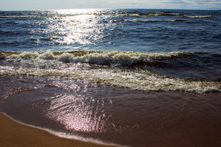 Lake Baikal shore with fresh water wavesの写真素材
