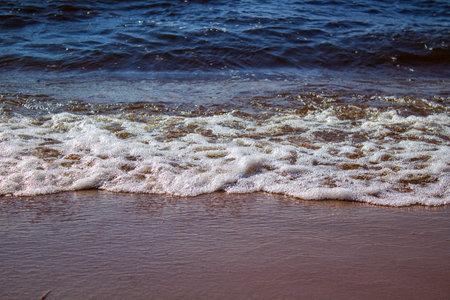Lake Baikal shore with fresh water waves