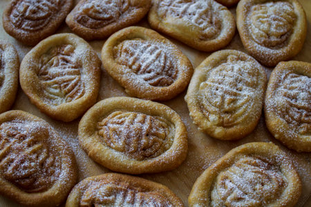 Mongolian National Bakery Boov with Ornament Close-up. Baked Cookies in powdered sugar.