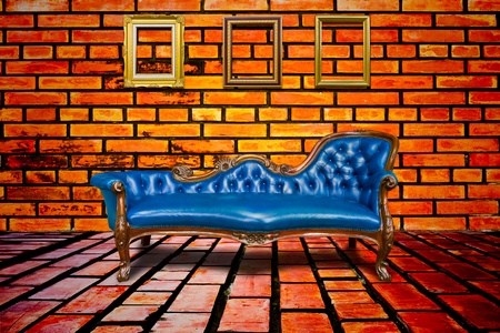 luxury blue armchair and wooden frame on brick wall