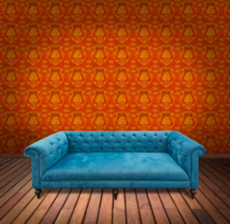 Sofa in yellow wallpaper roomの写真素材