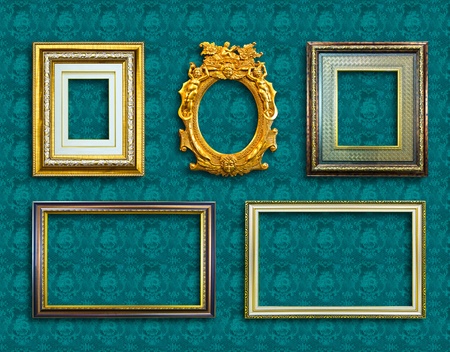 frame of golden wood  on blue wallpaperの写真素材