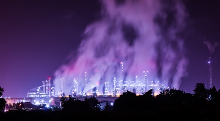 oil refinery plant and smoke at twilight morningの写真素材