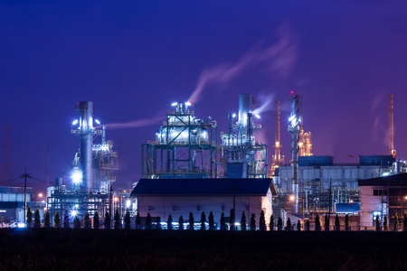 oil refinery plant and smoke at twilight morningの写真素材