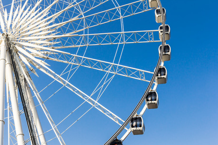 ferris wheel against blue sky