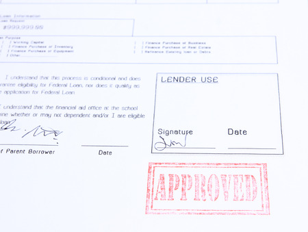 loan approved stamp on white document