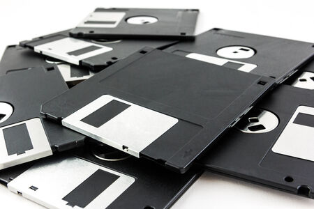 black diskette isolated on white backgroundの写真素材