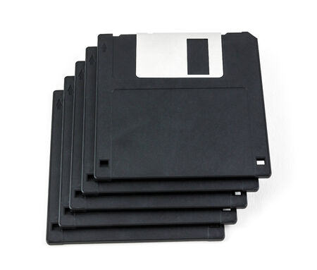 black diskette isolated on white backgroundの写真素材