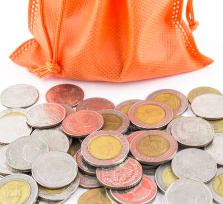 money coin and bag isolated on white backgroundの写真素材