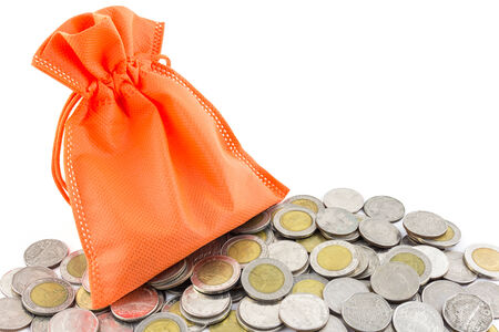 money coin and bag isolated on white backgroundの写真素材