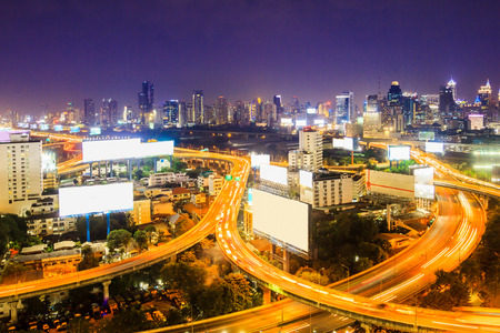 bangkok expressway with cityscape at duskの写真素材