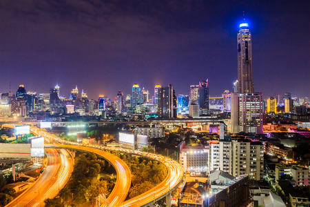 bangkok expressway with cityscape at duskの写真素材
