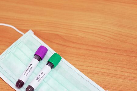 Covid-19 Blood Sample and medical equipment such as gloves,mask,syringe,pill,alcohol