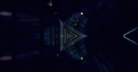 The scene shows an abstract arrangement of light and geometry. Triangular shapes emerge in a dark...