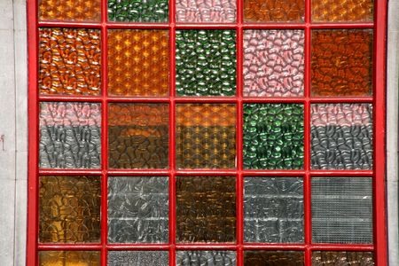 Colorful window panes - glass texture. Background of warm colours.