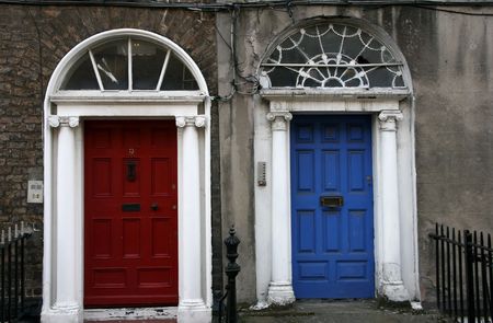 Georgian architecture of Dublin - twin doors in red and blueの写真素材