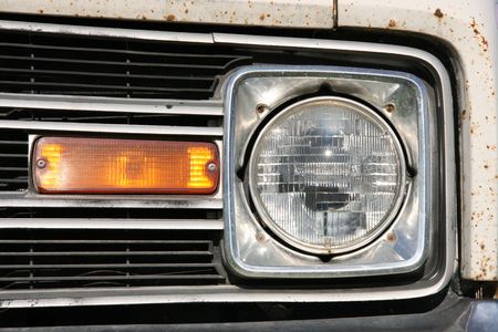 Vintage van - front lamp and rusty metal elements