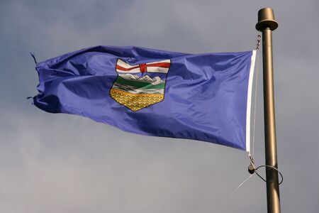 Flag of the Alberta province in Canada on the windの写真素材