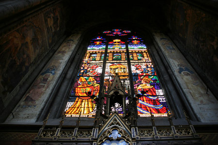 Beautiful artistic work - stained glass in Votivkirche (Votive Church) in Vienna, Austriaのeditorial素材