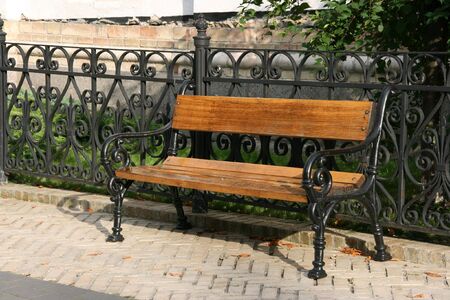 Single bench in a park in Pecherska Lavra, Kiev, Ukraineの写真素材