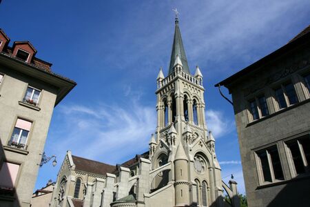 Saint Peter and Paul Church in Bern, Switzerland. Part of town hall (Rathaus) on the right.