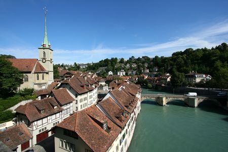 Bern cityscape. Nydeggkirche (Nydegg Church). Swiss city. View from Nydeggbruecke (Nydegg Bridge).