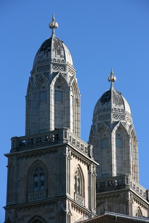 Beautiful towers of Romanesque style ex-cathedral church in Zurich, Switzerland. The church had important role in both Protestant and Catholic denominations.の写真素材