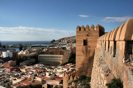 Almeria cityscape seen from Alcazaba fortified Moorish castle on a hill. Seaport in the background. Andalusia, Spain.の写真素材