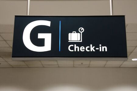 Sydney International Airport check-in illuminated signの写真素材