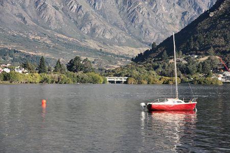 Boat on Lake Wakatipu - beautiful tourism destination in Otago, New Zealandの写真素材