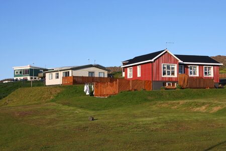Little generic homes in Djupivogur, small town in Icelandの写真素材