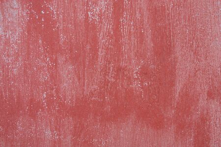 Red painted tin - grungy background texture abstract