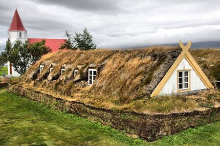 Turf and grass roof in a museum buildings in Glaumbaer.の写真素材