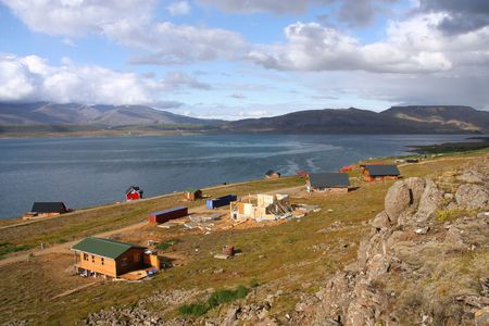 Small village next to Hvalfjordur fiord in Iceland. Typical Nordic residential architecture. Wooden houses.の写真素材