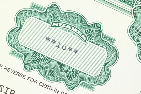 16 shares. Old stock share certificate. Vintage scripophily objects.の写真素材