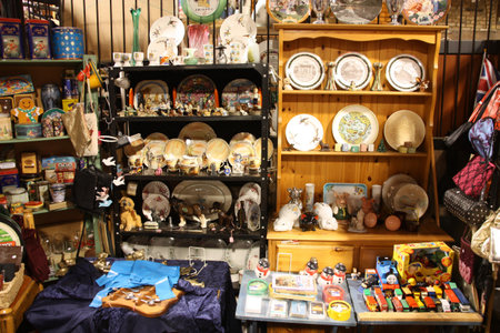 LONDON - JANUARY 21, 2009: Typical trinket stall at Camden Town Market on January 21, 2009. Vendors from the famous market have been protesting against opening popular chain stalls there in 2008 and 2009.のeditorial素材