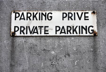 Private parking sign in two languages: French and English. Brussels, Belgium.の写真素材