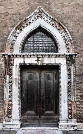 Venice, Italy - door to church of Saint Gregory (Chiesa di San Gregorio), belonging to the Benedictine abbeyの写真素材