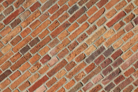 Brick wall - orange background texture. Patterned abstract.