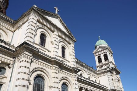 Christchurch, Canterbury, New Zealand - Roman Catholic Cathedral of the Blessed Sacrament. The tower on the right collapsed in infamous 2011 earthquake.の写真素材