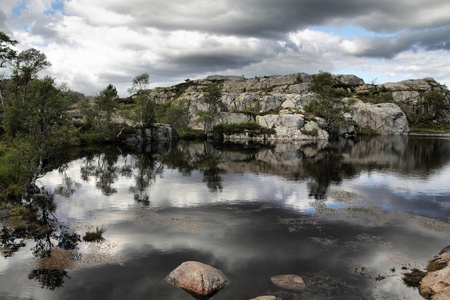 Norway, Rogaland county. Beautiful view of small lake from the trail to Preikestolen.