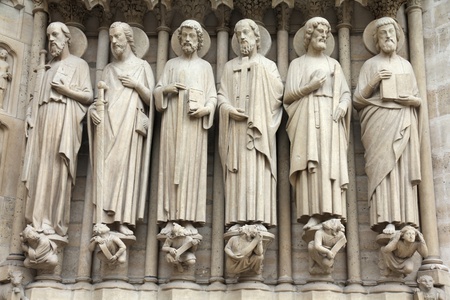 Paris, France - famous Notre Dame cathedral facade saint statues. の写真素材