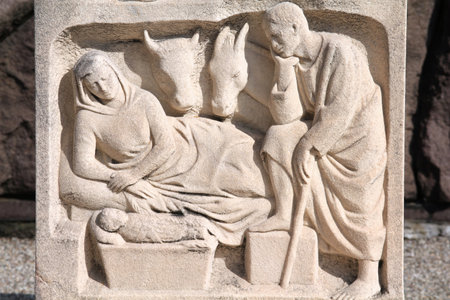 Milan, Italy. Old grave nativity scene sculpture at the Monumental Cemetery (Cimitero Monumentale). Religious art.のeditorial素材